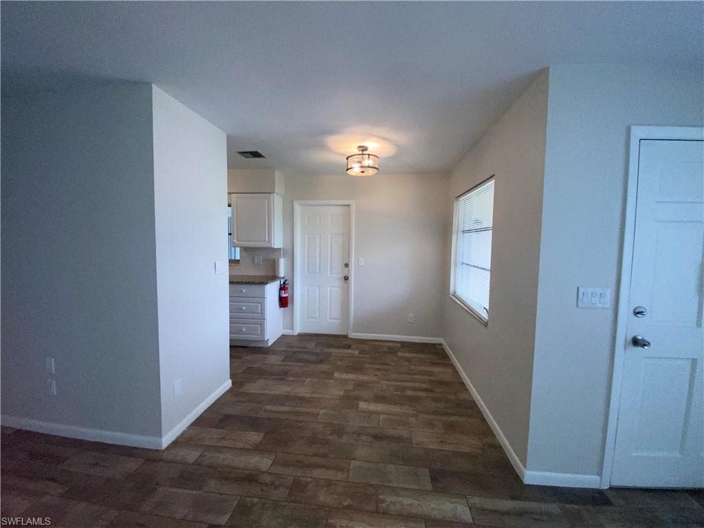 209 Rockcliff Ave, Lehigh Acres, FL 33936-4