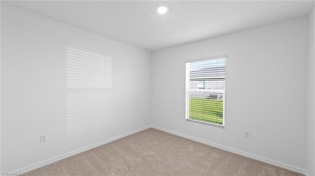 515 Redwood Ave S, Lehigh Acres, FL 33974-9