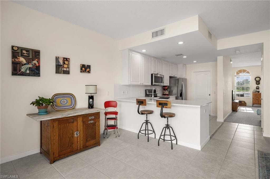 6072 Towncenter Cir, Naples, FL 34119-16