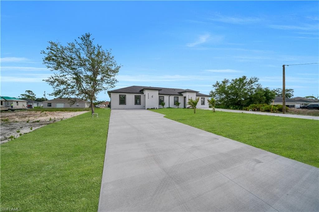 928/930 Hepburn Ave, Lehigh Acres, FL 33974-3