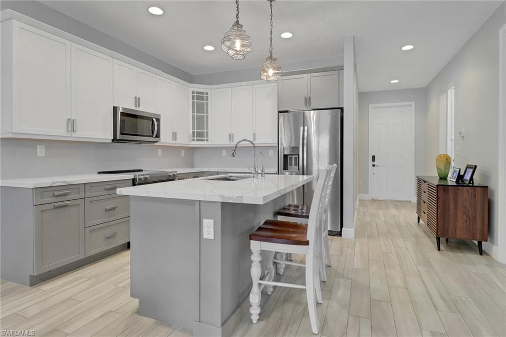 8858 Madrid Cir, Naples, FL 34104-5