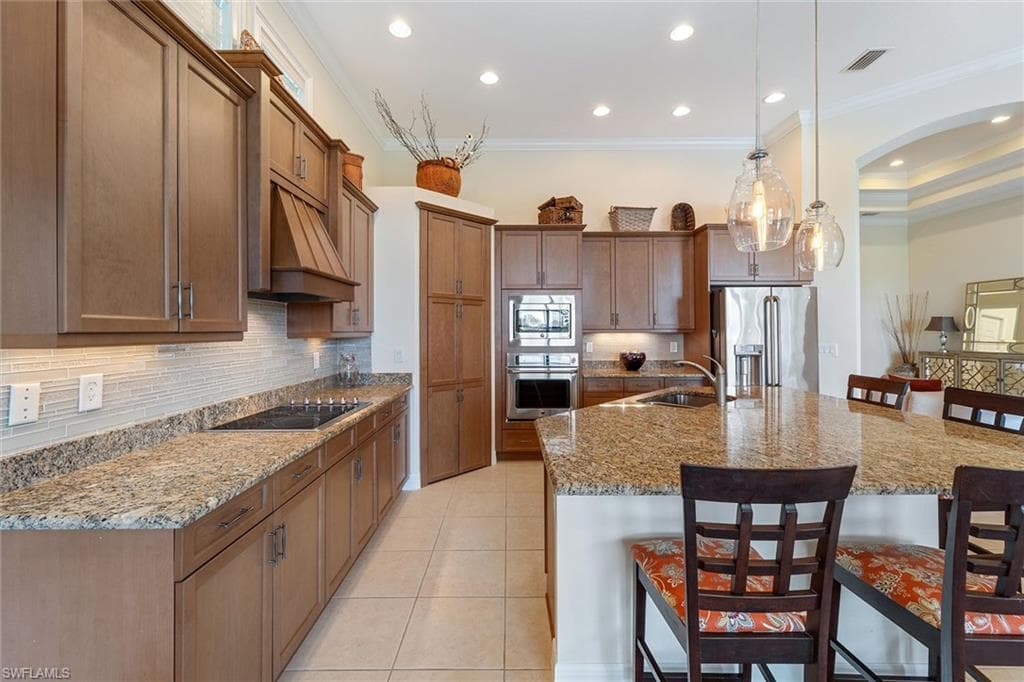12440 Wisteria Dr, Naples, FL 34120-7
