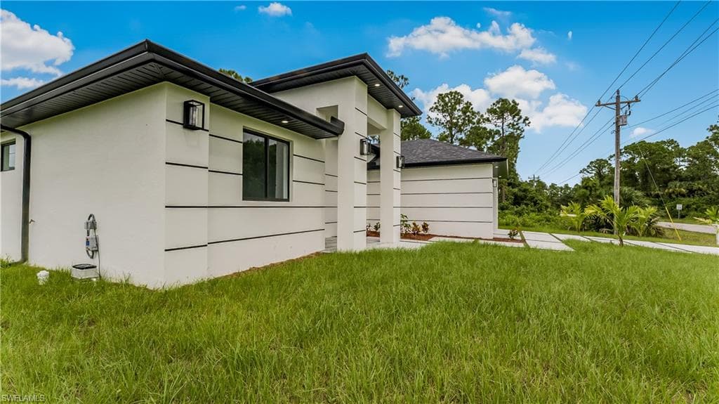 178 Mcarthur Blvd, Lehigh Acres, FL 33974-9