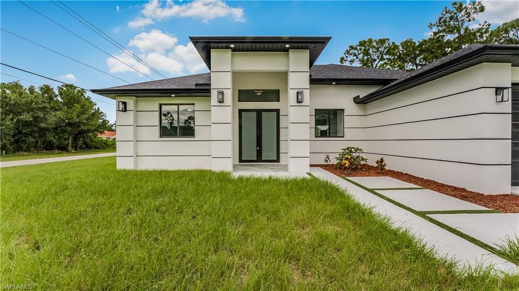 178 Mcarthur Blvd, Lehigh Acres, FL 33974-1