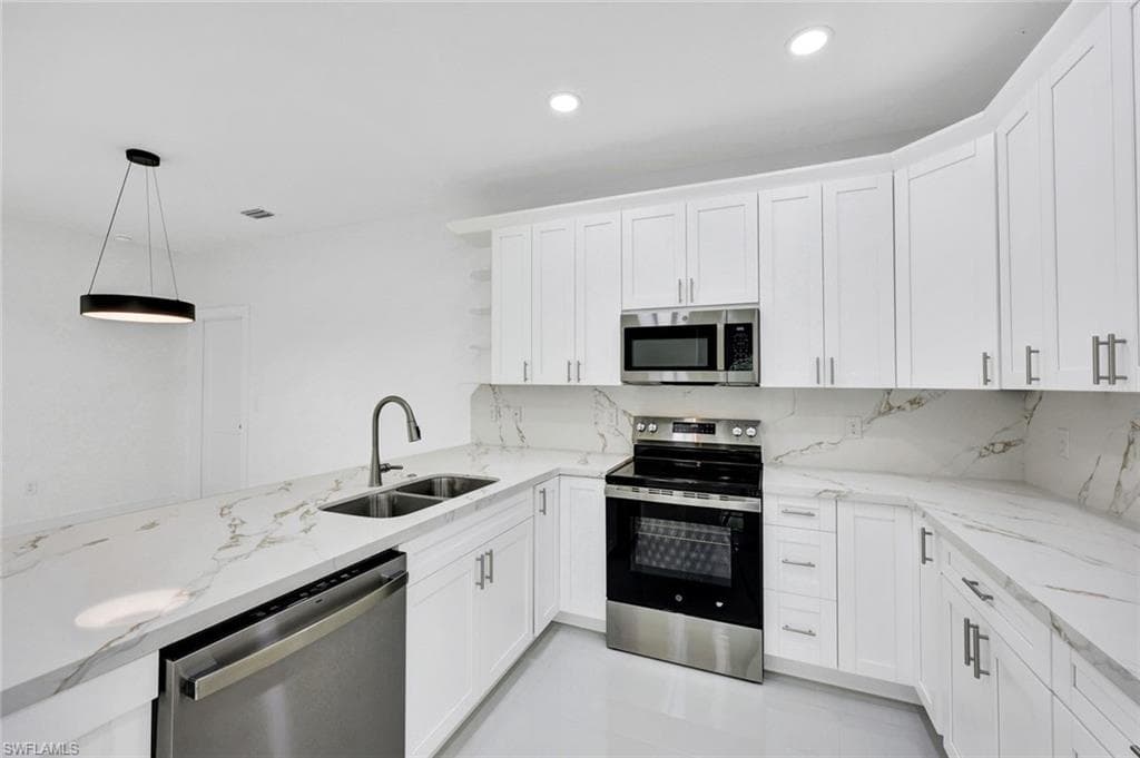 1137 Rahway St E, Lehigh Acres, FL 33974-8