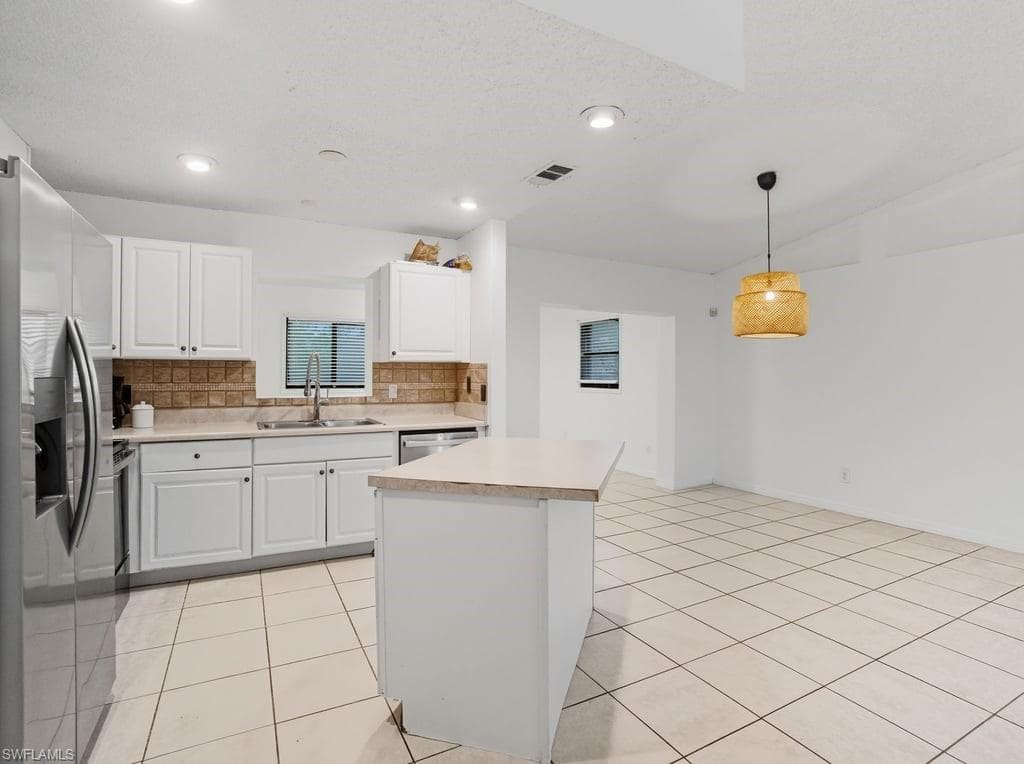 242 1st Ave, Cape Coral, FL 33990-9