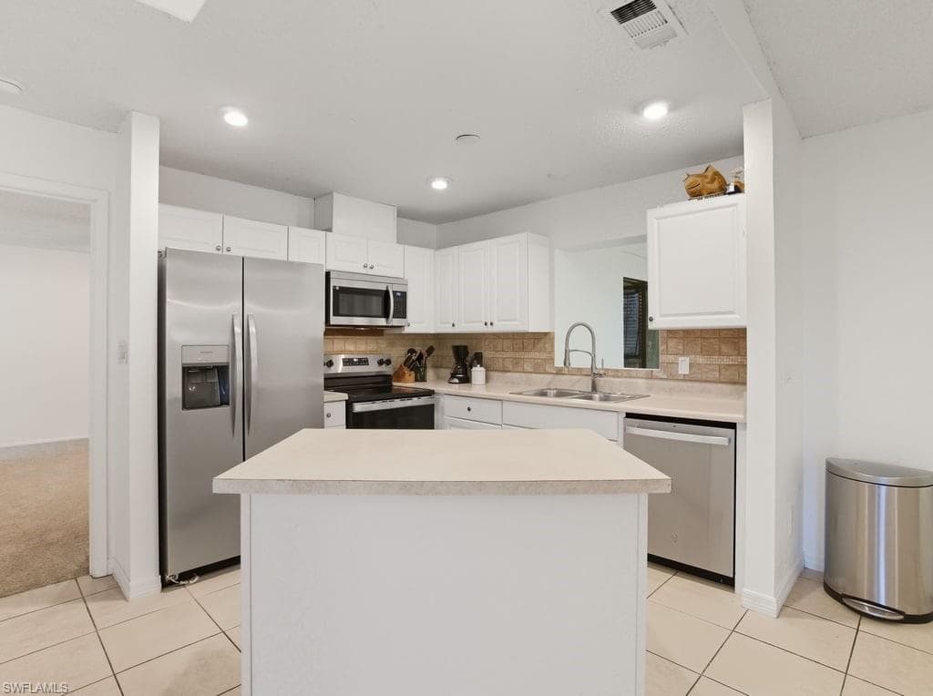 242 1st Ave, Cape Coral, FL 33990-8
