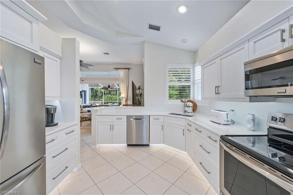 1753 Winding Oaks Way, Naples, FL 34109-5