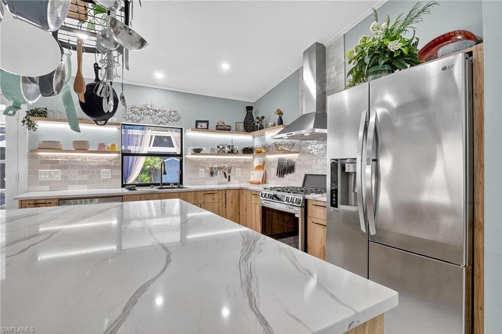 410 6th St NE, Naples, FL 34120-12