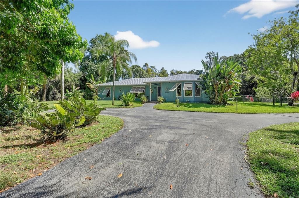 410 6th St NE, Naples, FL 34120-50