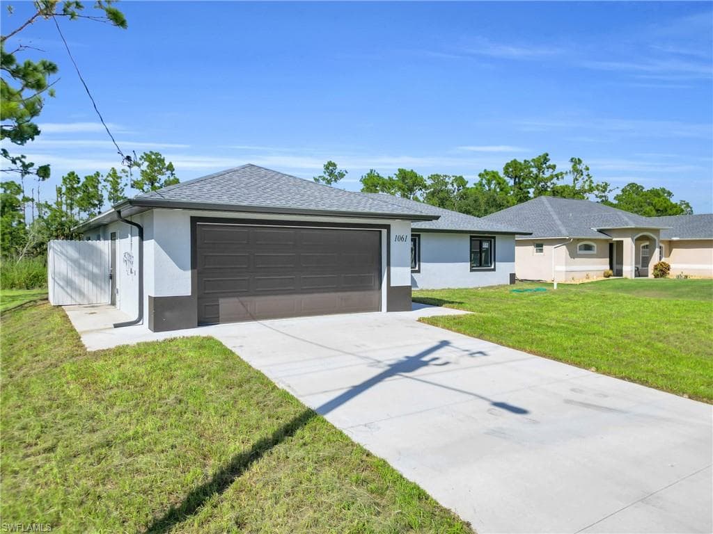 509 Eisenhower Blvd, Lehigh Acres, FL 33974-1