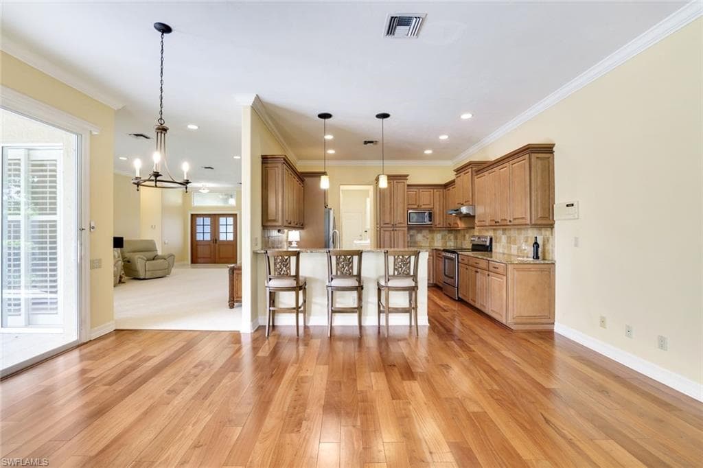 2032 Castle Garden Ln, Naples, FL 34110-9