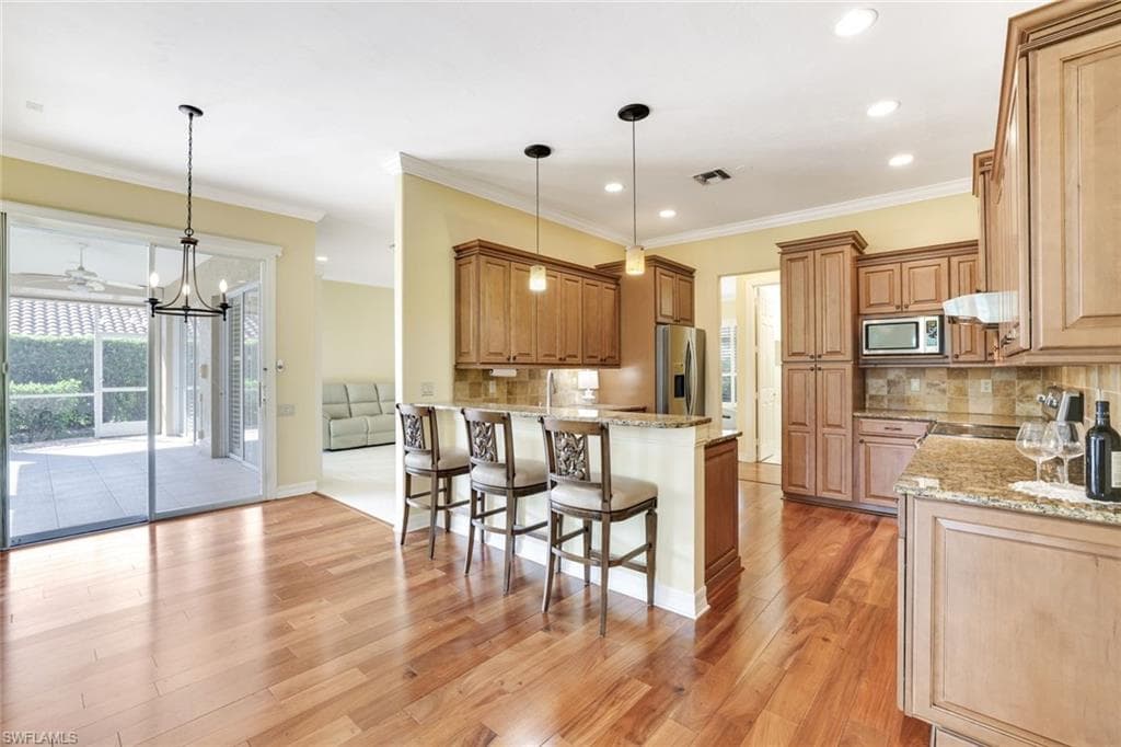 2032 Castle Garden Ln, Naples, FL 34110-3