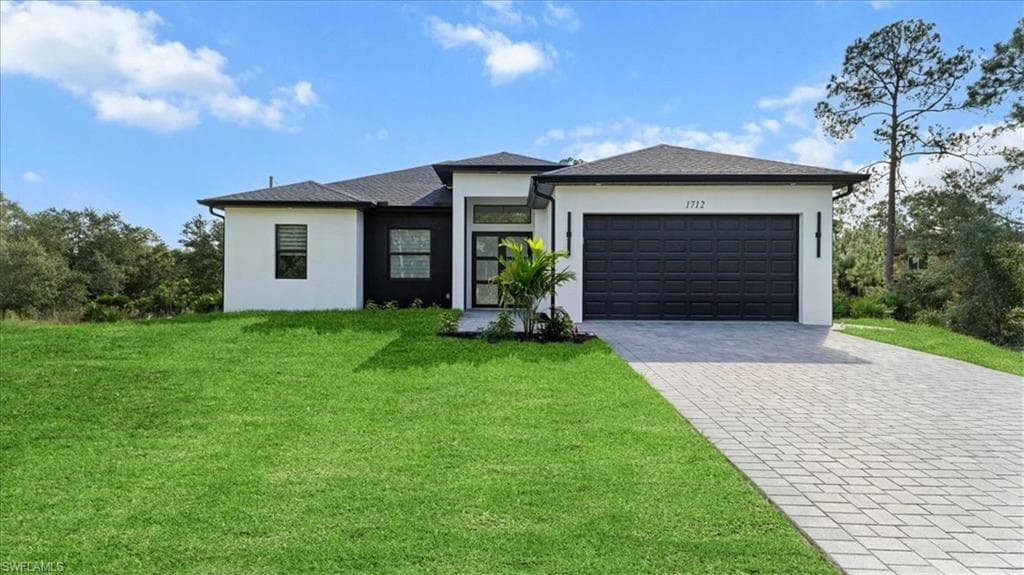 1712 Plumosa Ave, Lehigh Acres, FL 33972-3