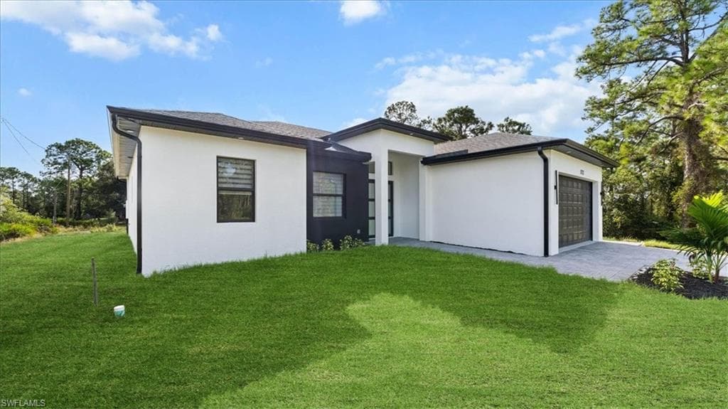 1712 Plumosa Ave, Lehigh Acres, FL 33972-4