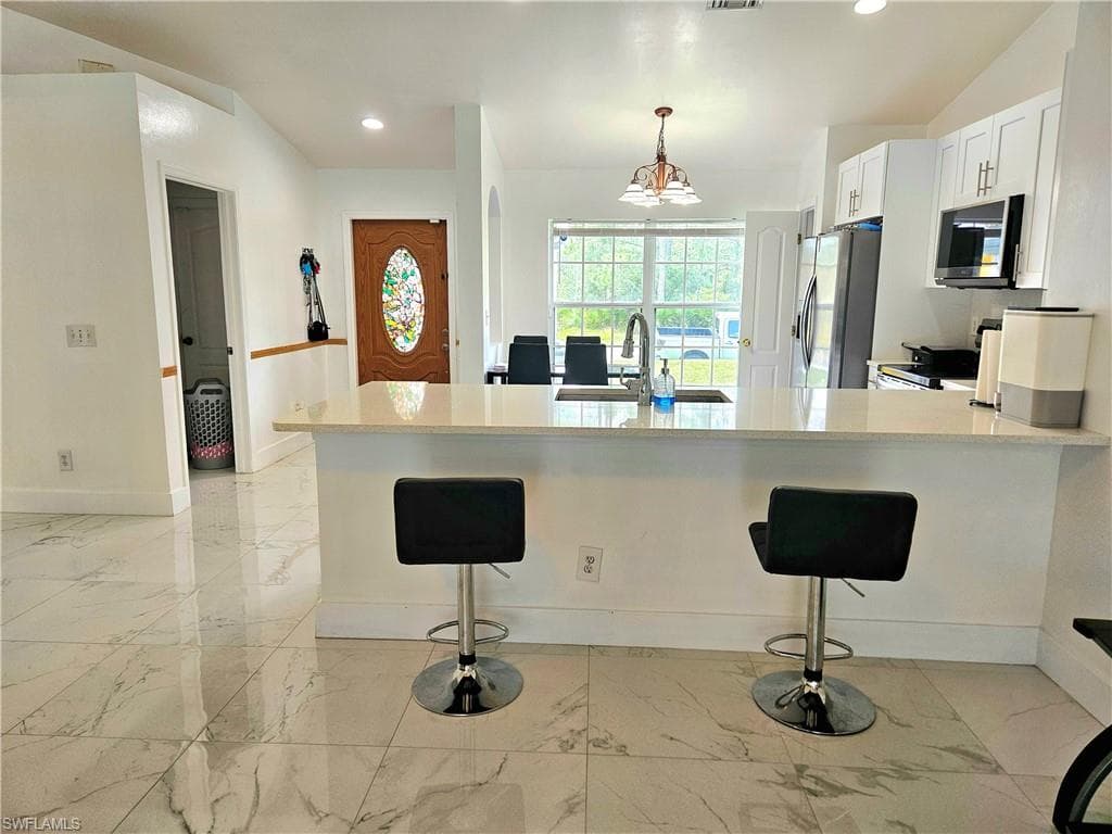 169 Brown Ave S, Lehigh Acres, FL 33974-9