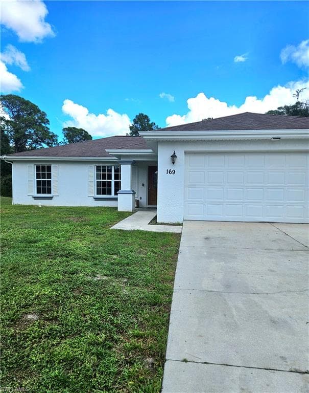 169 Brown Ave S, Lehigh Acres, FL 33974-2