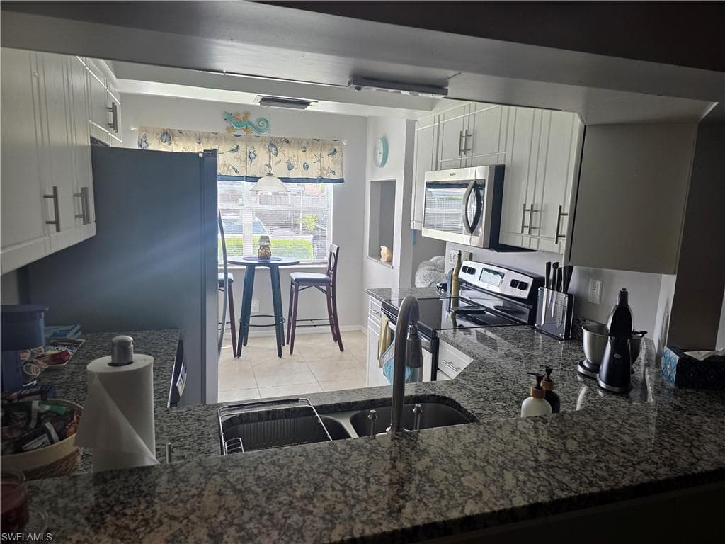 137 Wading Bird Cir F103, Naples, FL 34110-25