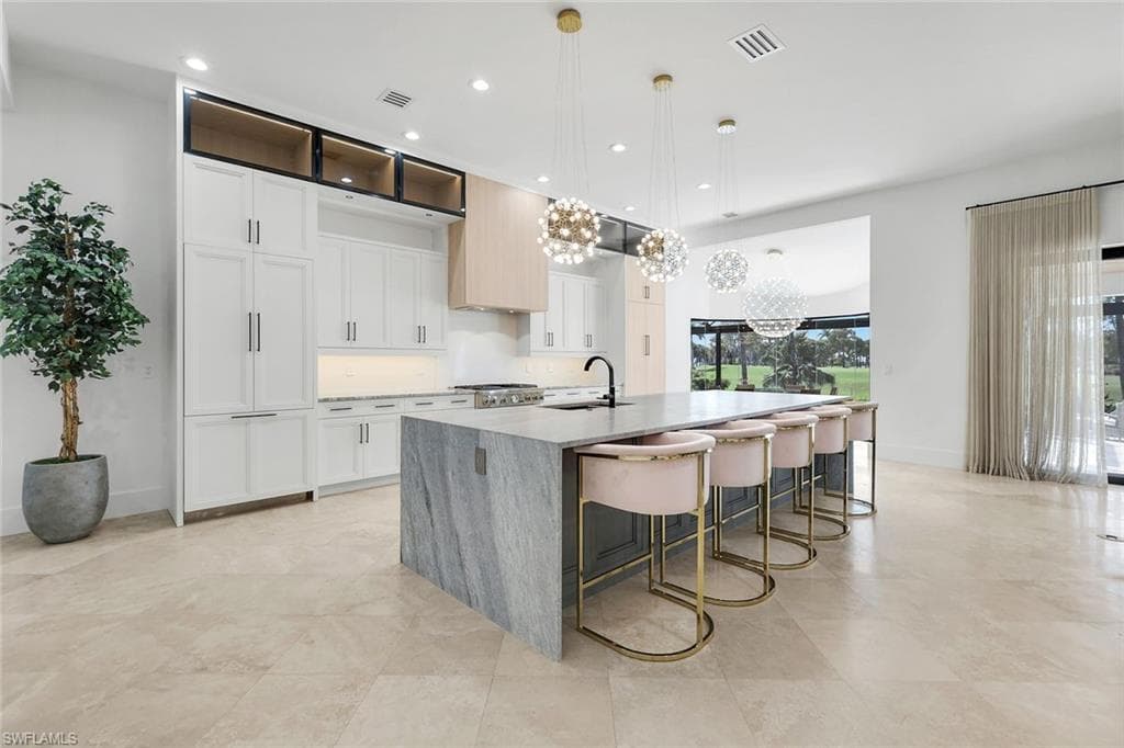 13087 Pond Apple Dr E, Naples, FL 34119-12