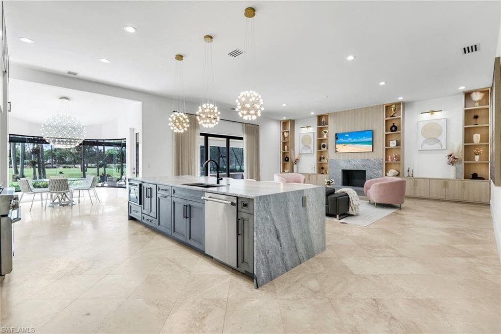 13087 Pond Apple Dr E, Naples, FL 34119-13