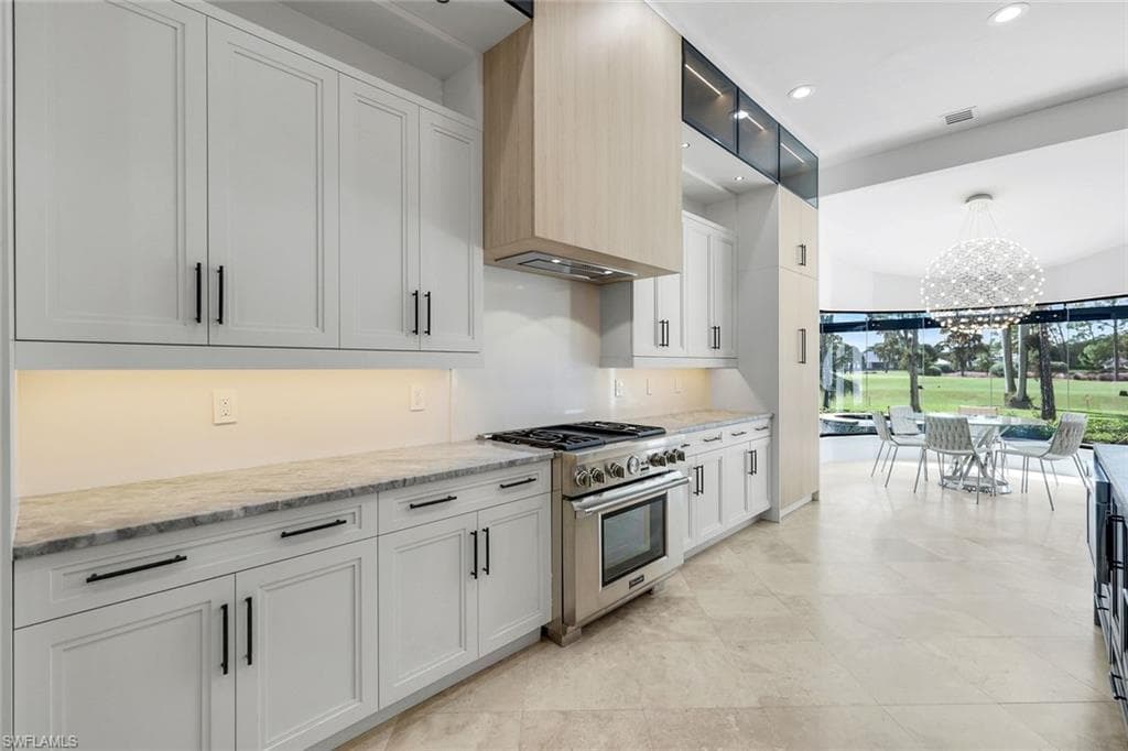 13087 Pond Apple Dr E, Naples, FL 34119-14