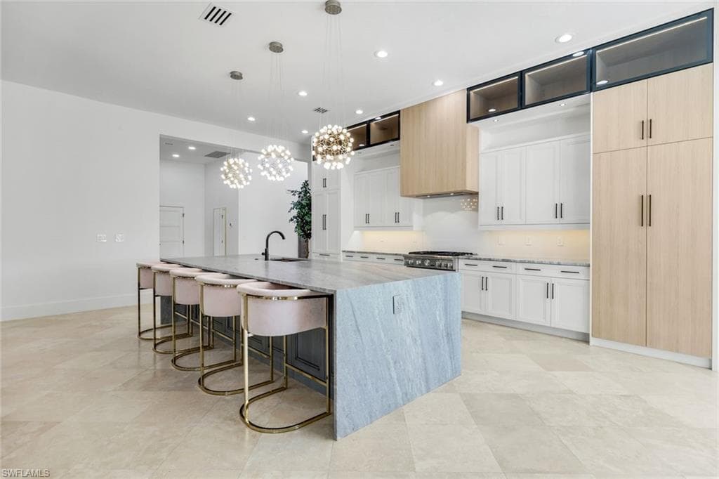 13087 Pond Apple Dr E, Naples, FL 34119-15