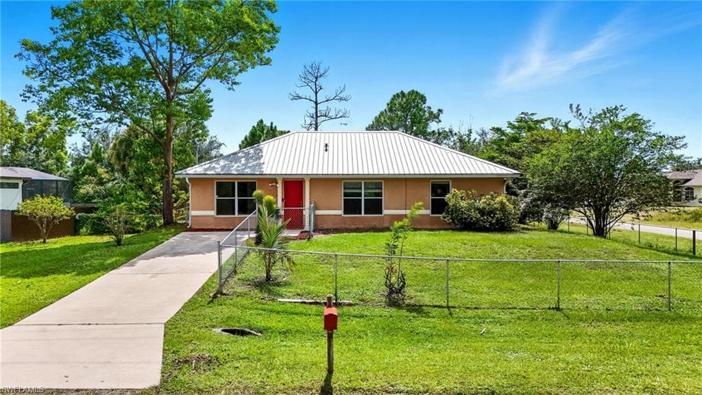 3102 12th St, Lehigh Acres, FL 33972-1