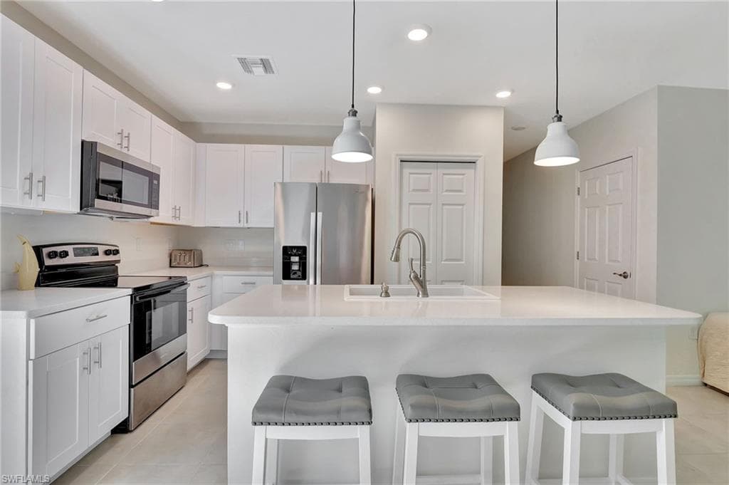 15489 Wildflower Cir, Naples, FL 34119-14