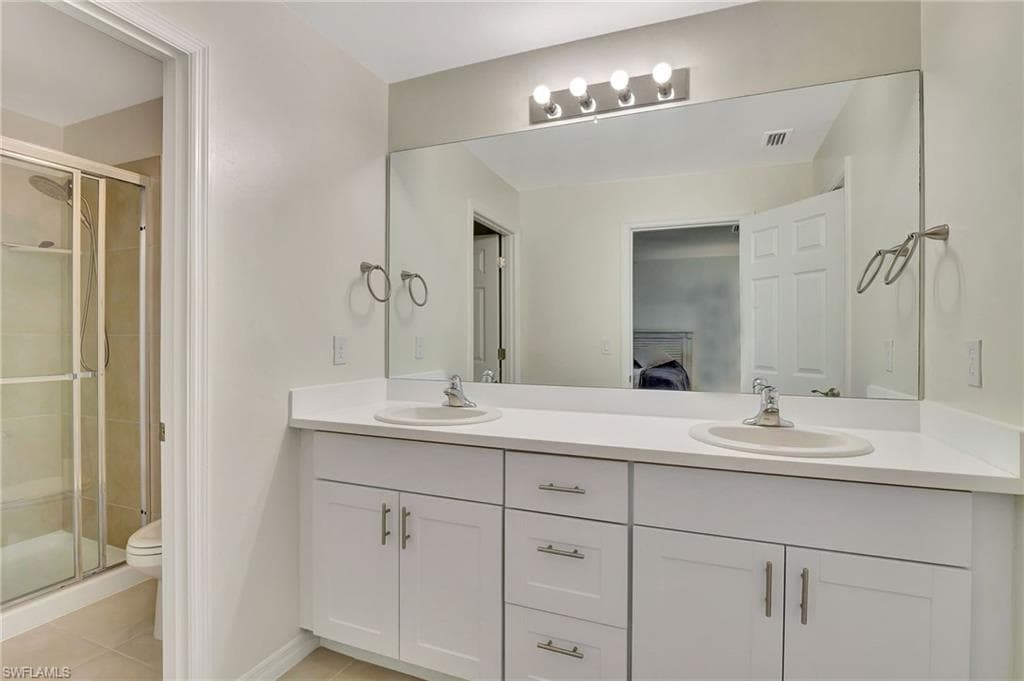 15489 Wildflower Cir, Naples, FL 34119-34
