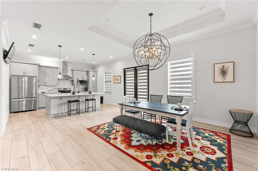 110 6th St NE, Naples, FL 34120-12