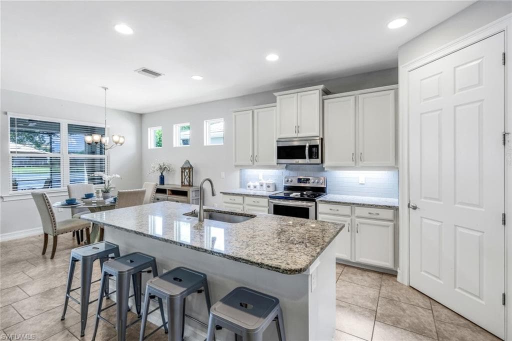 14639 Topsail Dr, Naples, FL 34114-13