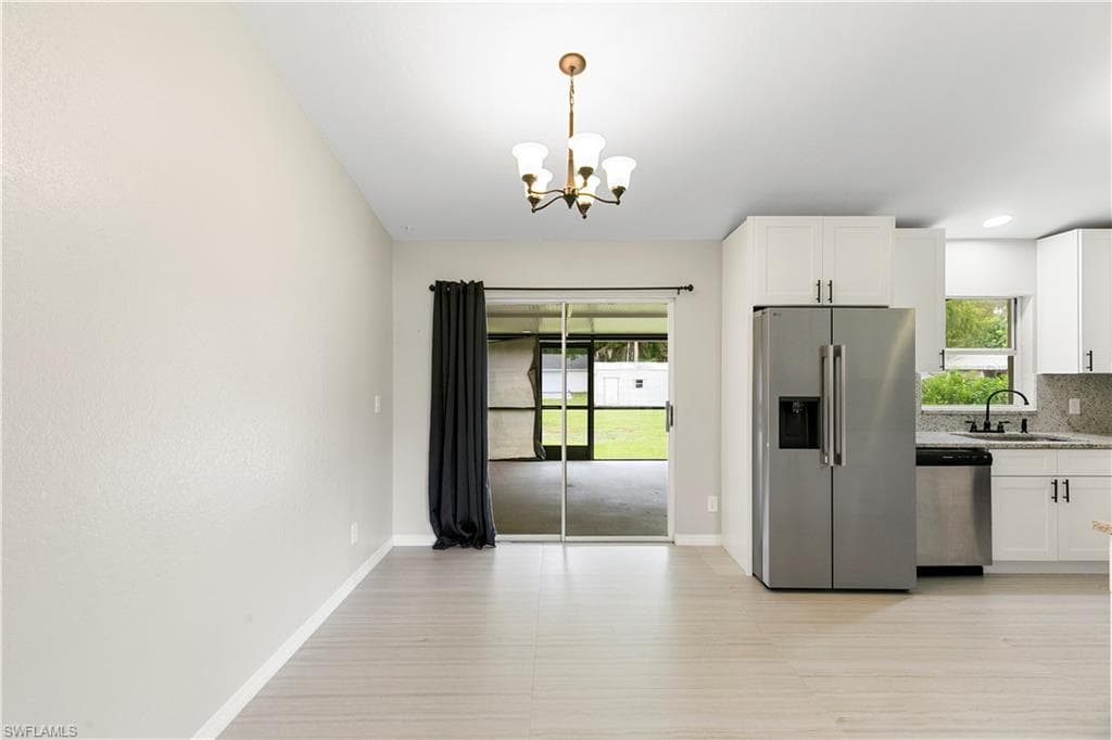 241 8th St SE, Naples, FL 34117-29