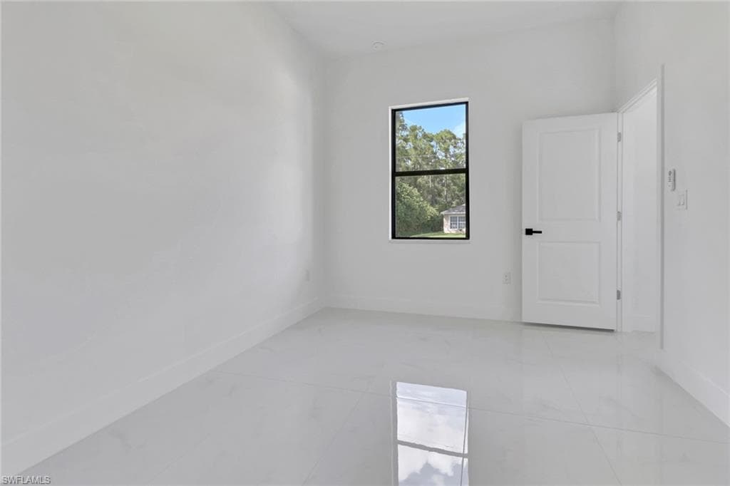3303 32nd St W, Lehigh Acres, FL 33971-24