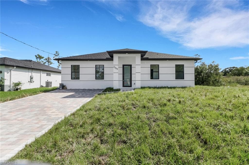 3303 32nd St W, Lehigh Acres, FL 33971-1