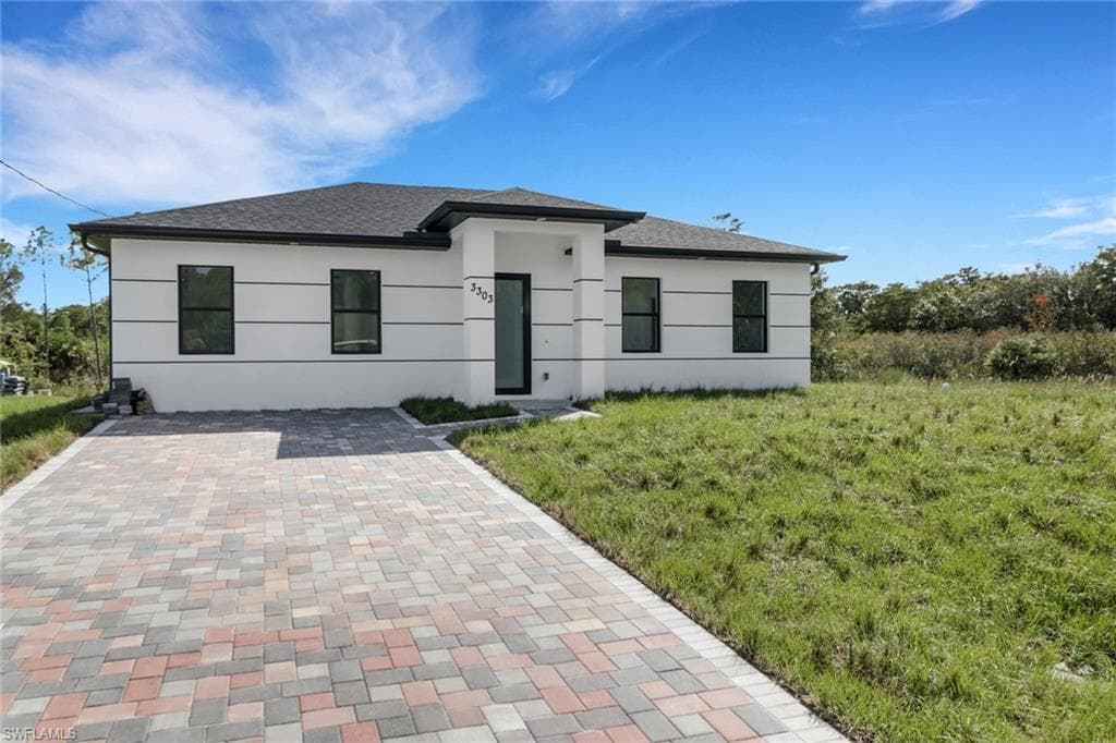3303 32nd St W, Lehigh Acres, FL 33971-2