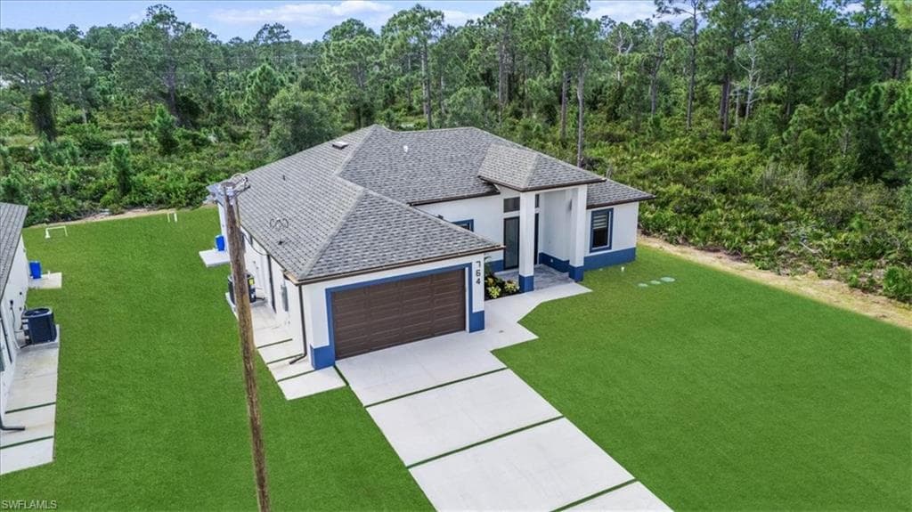 764 Roma Ave S, Lehigh Acres, FL 33974-8