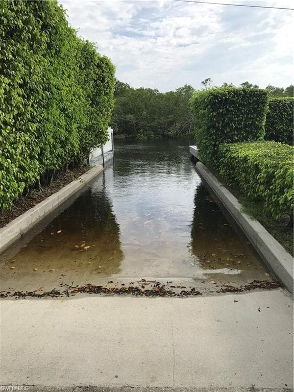 1277 Grand Canal Dr, Naples, FL 34110-12