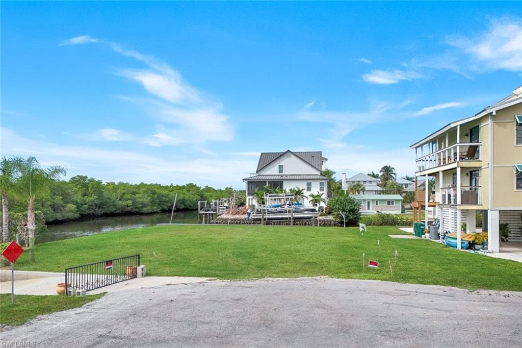 1277 Grand Canal Dr, Naples, FL 34110-13