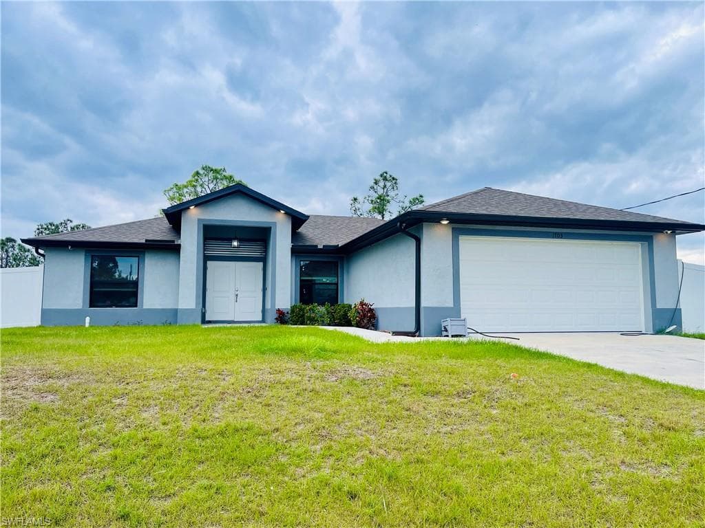 1703 Edison Ave, Lehigh Acres, FL 33972-1