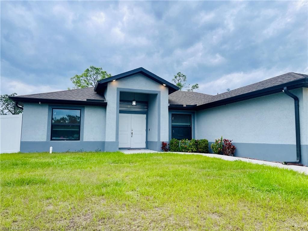 1703 Edison Ave, Lehigh Acres, FL 33972-3