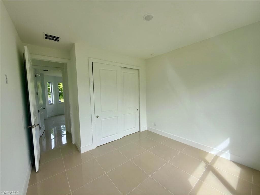 523 Harry Thayer Ave S, Lehigh Acres, FL 33974-9