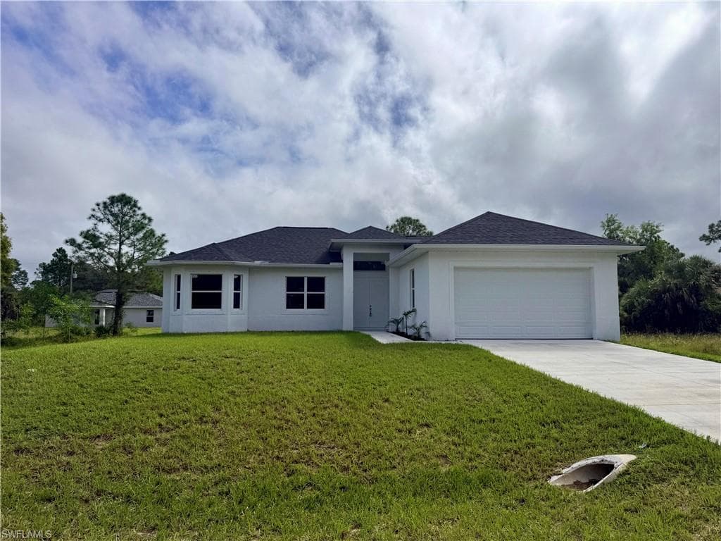 523 Harry Thayer Ave S, Lehigh Acres, FL 33974-1