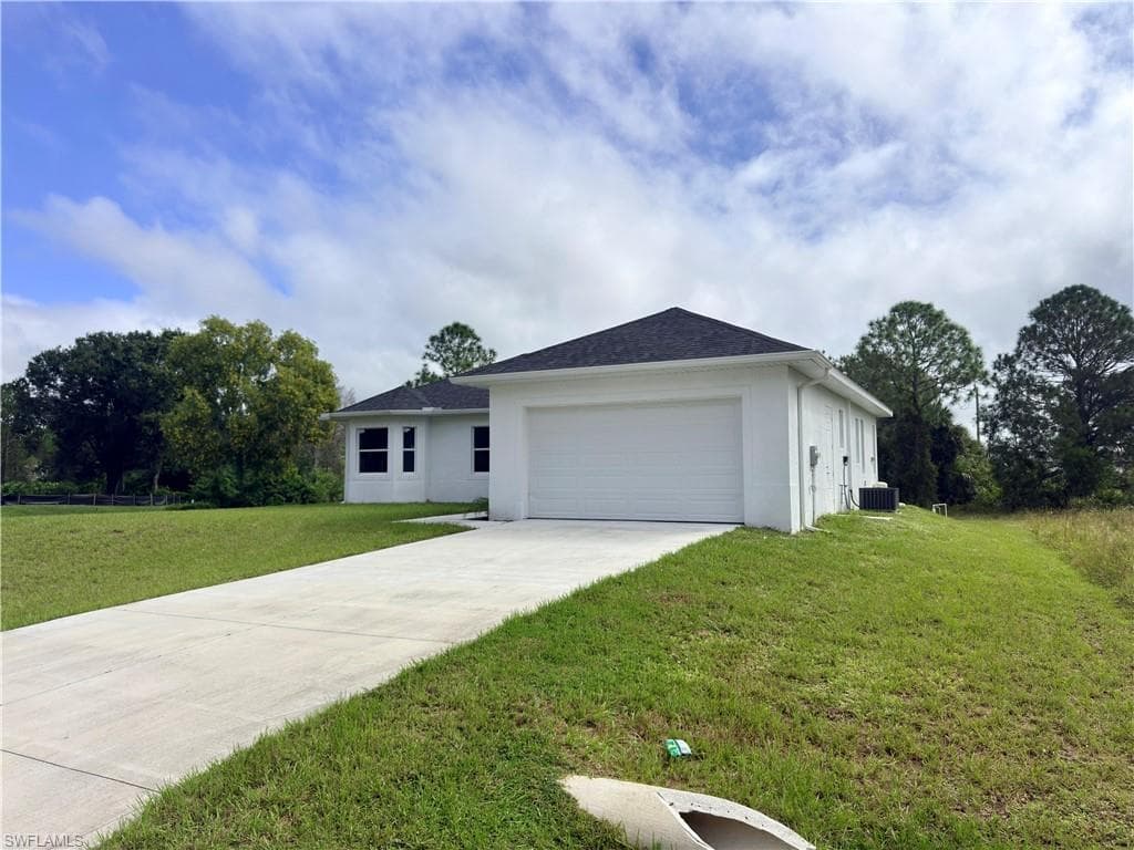 523 Harry Thayer Ave S, Lehigh Acres, FL 33974-2