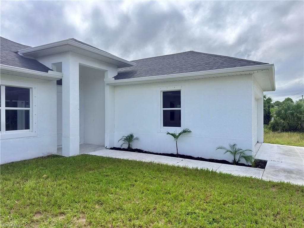 523 Harry Thayer Ave S, Lehigh Acres, FL 33974-3