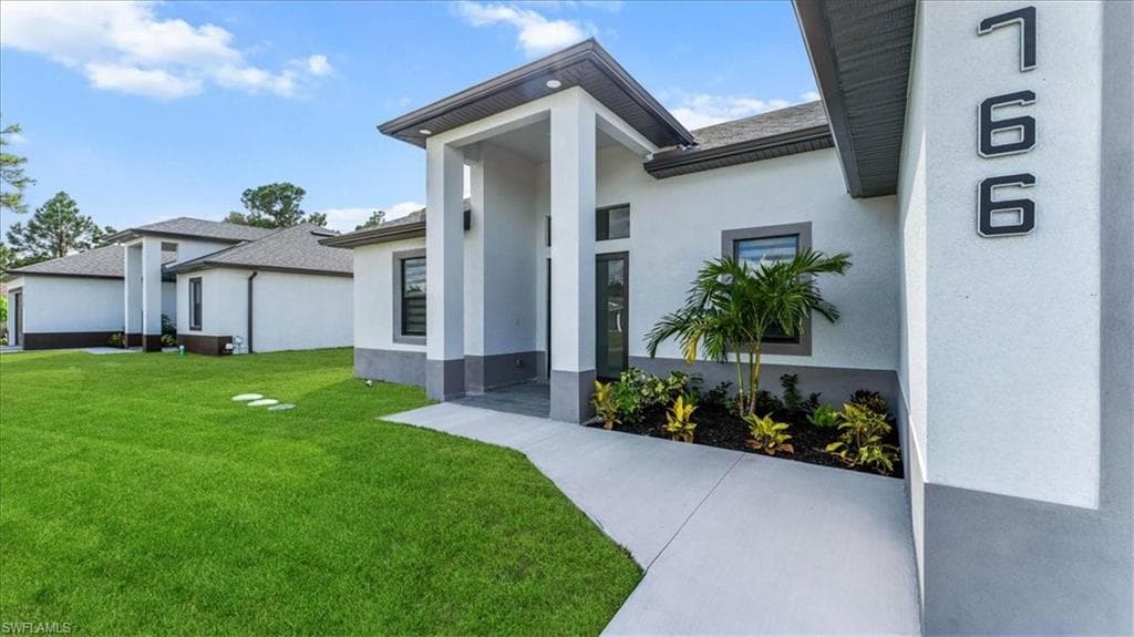 766 Roma Ave S, Lehigh Acres, FL 33974-2
