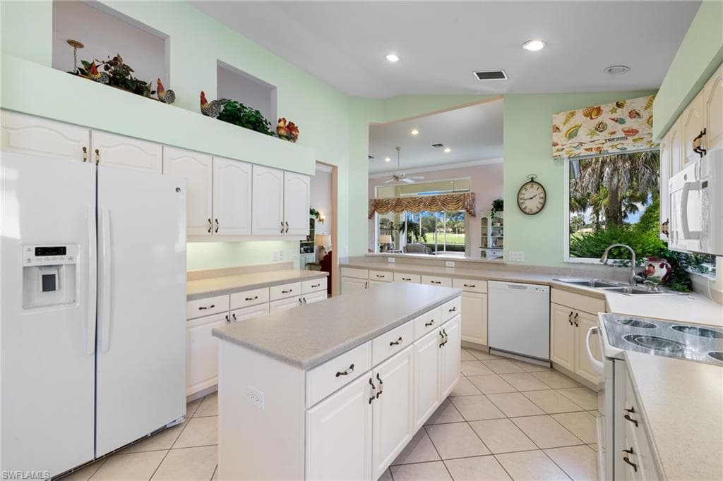 1724 Winding Oaks Way, Naples, FL 34109-13