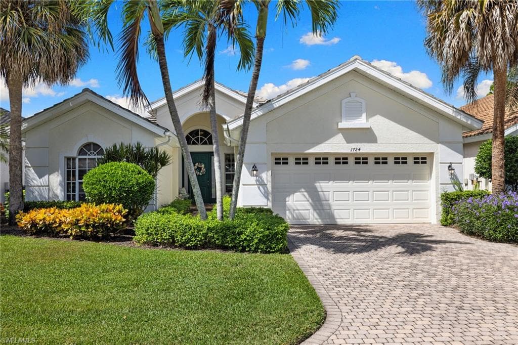 1724 Winding Oaks Way, Naples, FL 34109-1