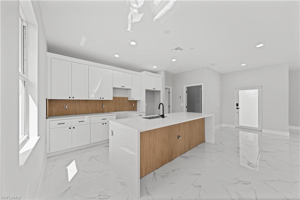 1015 Merry St E, Lehigh Acres, FL 33974-7