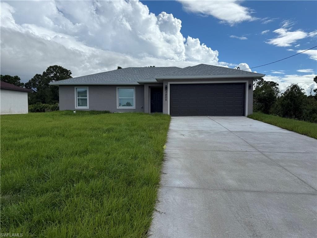 2805 14th St SW, Lehigh Acres, FL 33976-1