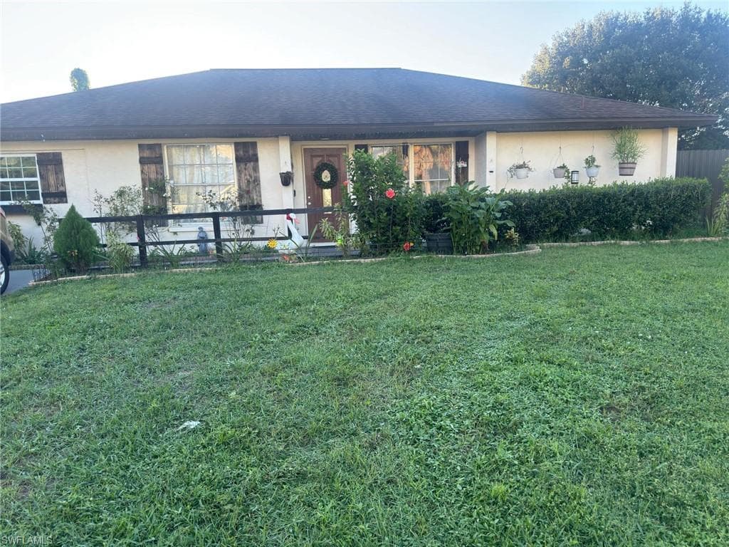 411 Roosevelt Ave, Lehigh Acres, FL 33936-2